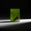 Green supplement package with 'UP' branding on a black background