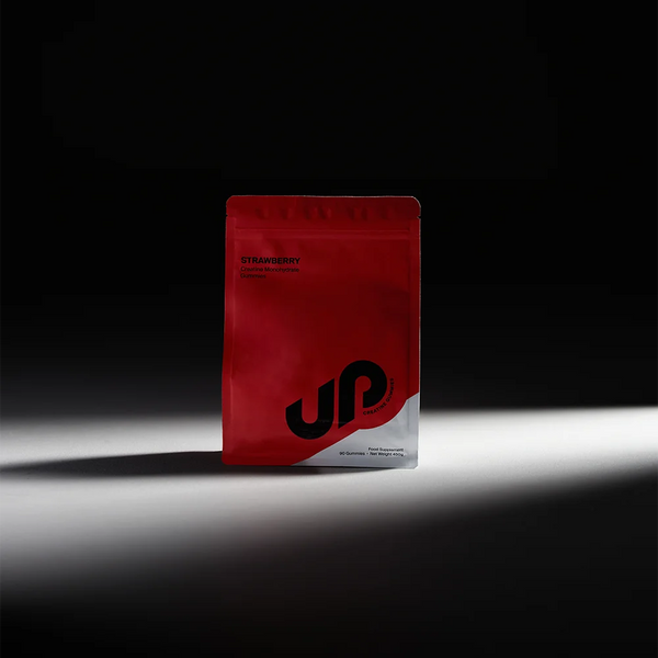 Red package with black logo on a dark background